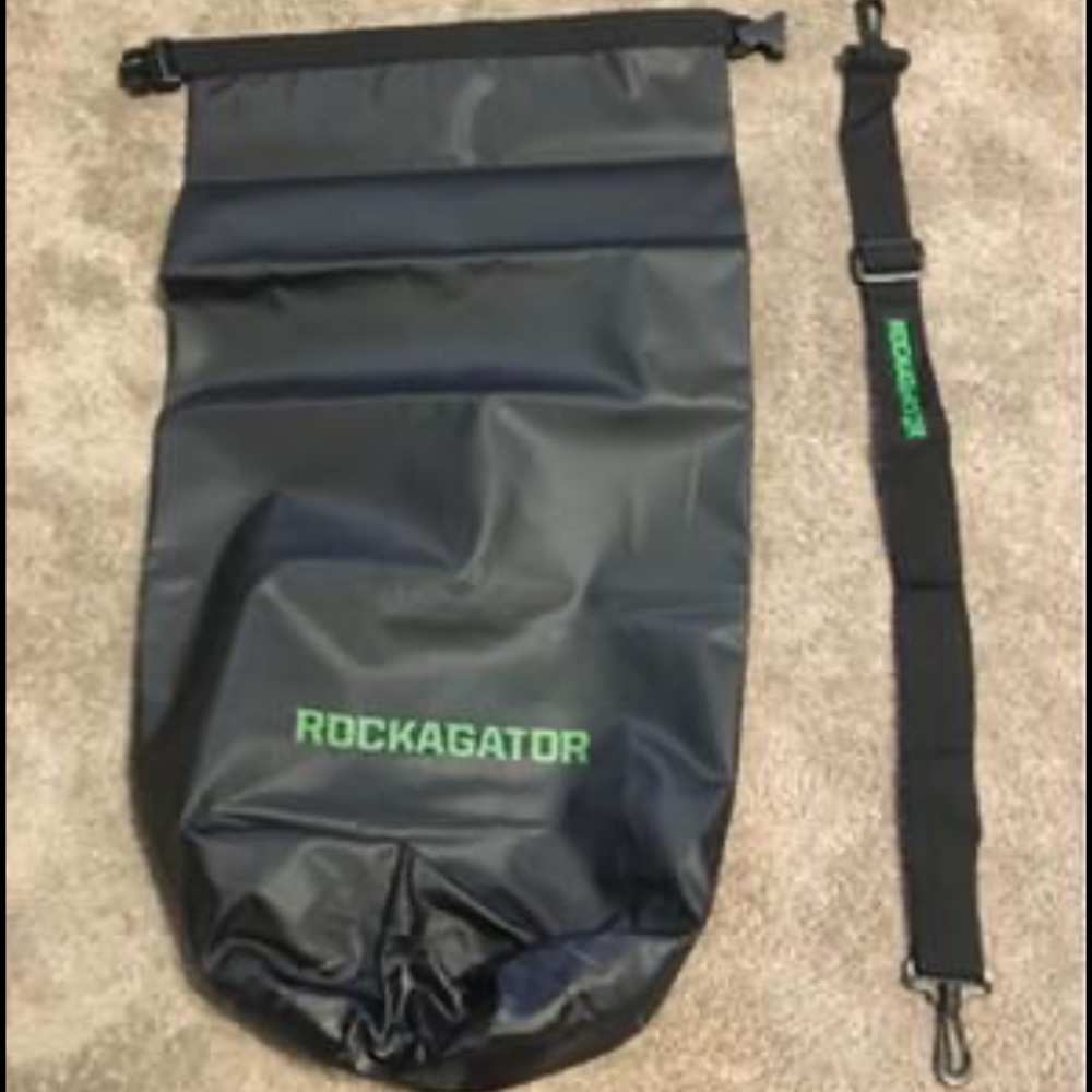 ROCKAGATOR SLING BAG ( NEVER USED)